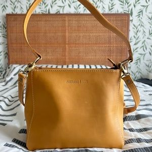 Portland Leather’s Triangle Shoulder Bag with crossbody strap in Sunflower